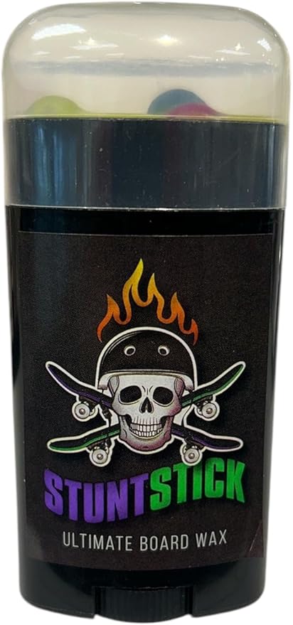 Stunt Stick Skateboard Wax features a vibrant design and easy-to-use roll-up tube for smooth grinds and slides.
