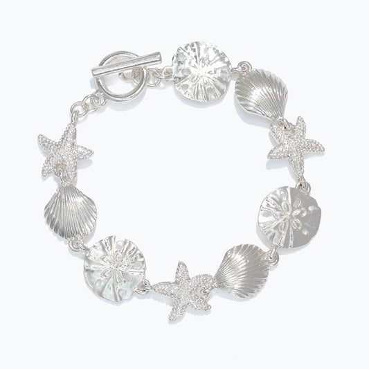 Linked Silver Sea Life Bracelet With Delicate Motifs